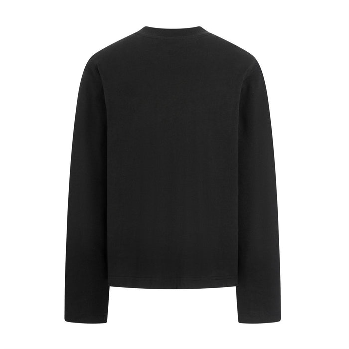 Black long sleeve tee shown from the back, highlighting its plain fabric and straight hem