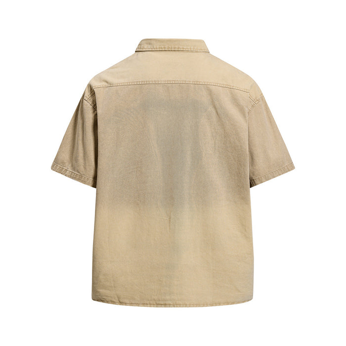 Back view of washed khaki short sleeve button-up shirt with plain panel