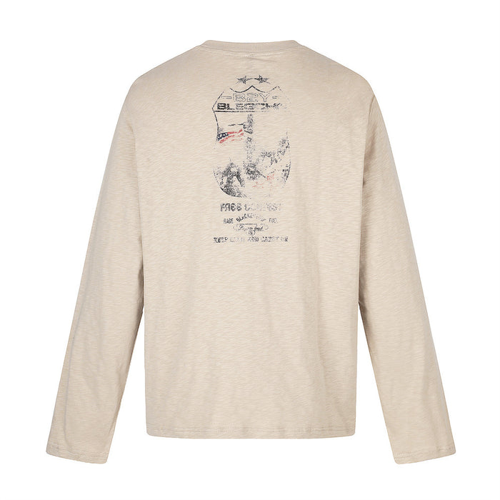 Back view of beige long sleeve tee with faded graphic print near the neck