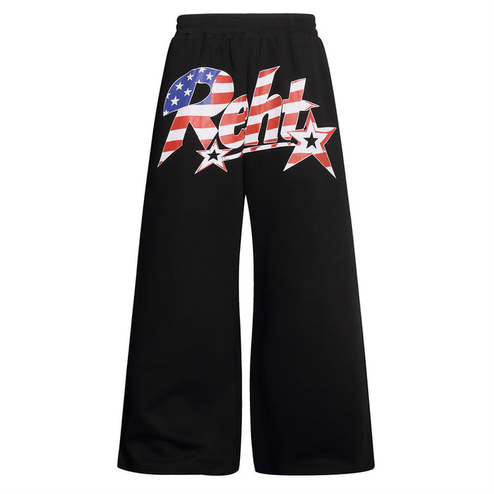 Black wide-leg sweatpants shown from the front with a red, white, and blue star graphic