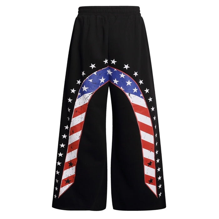 Back view of black wide-leg sweatpants with an arched flag-stripe panel and white stars
