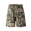 Green camouflage cargo shorts with drawstring waist and distressed front view