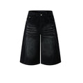 Men's baggy wide-leg distressed denim jean shorts in washed black with vintage crease detailing, front view