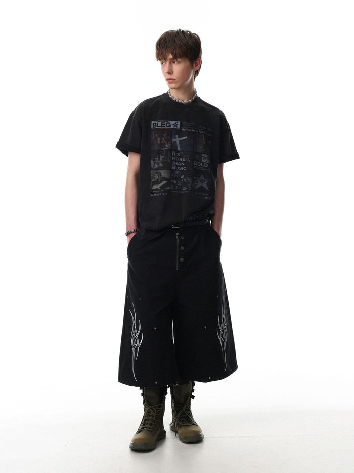 Model wearing a black graphic T-shirt with a rectangular music collage print on the front