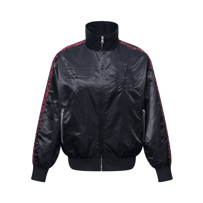 Men's oversized satin track jacket with embroidered winged crest on back and contrast leopard-print tape sleeves, shown in si
