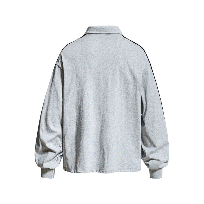 Back view of heather gray long sleeve rugby shirt with plain solid back and black sleeve stripes