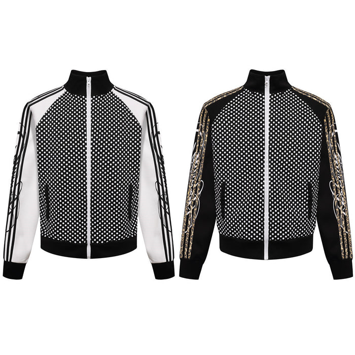 Two front views of black polka dot track jackets, one with white sleeves and one with gold-patterned black sleeves