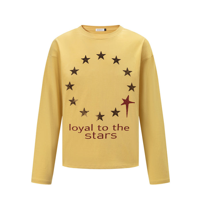 Men's long-sleeve crew neck tee with circular distressed star print and 'loyal to the stars' slogan in yellow colorway