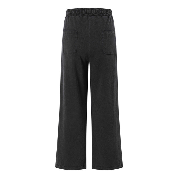 Black wide-leg sweatpants shown from the back with an elastic waistband and two rear patch pockets