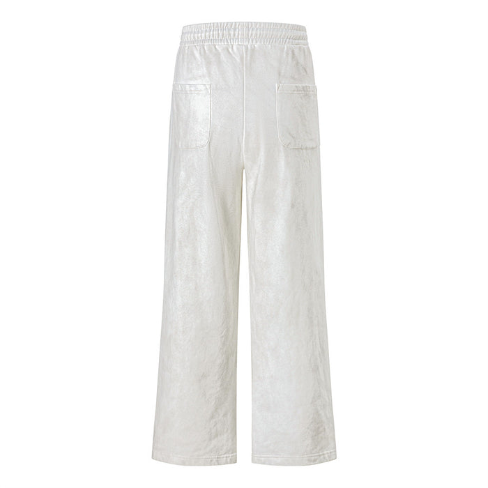 White wide-leg sweatpants shown from the back with two rear patch pockets and an elastic waistband