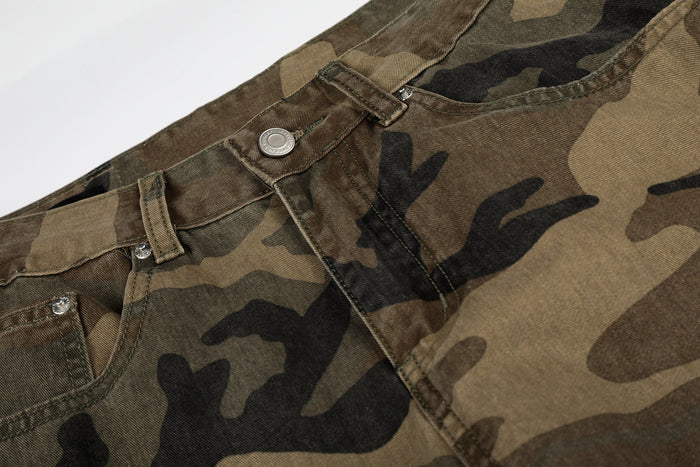 Close-up of camouflage jean waistband with button, belt loop, and topstitching