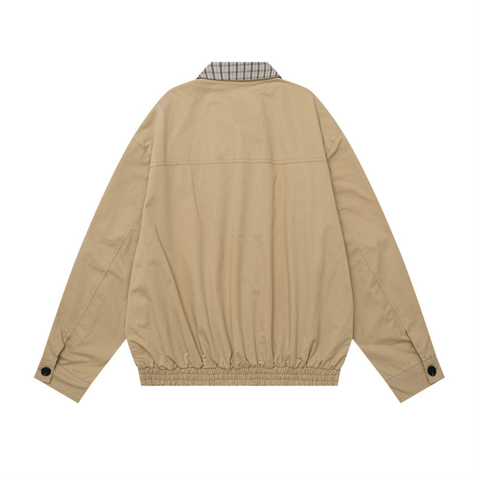 Tan Harrington jacket shown from the back with a plaid collar, long sleeves, and elasticized hem