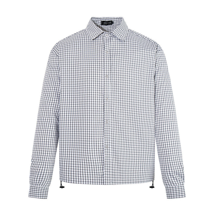 White plaid long-sleeve shirt shown from the front with a pointed collar, buttons, and drawstring hem