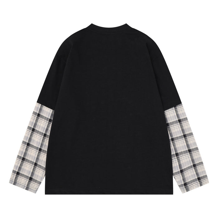 Back view of the black long-sleeve T-shirt with a plain body and gray plaid sleeve panels