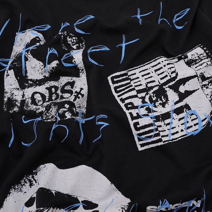 Close-up of the upper front graphic showing blue script lettering and distressed monochrome printed designs