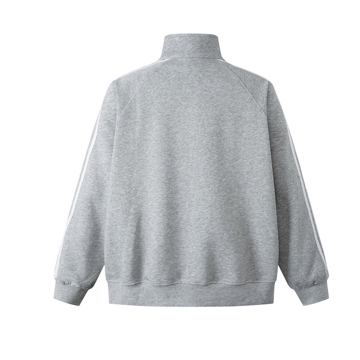 Back view of gray track jacket with white sleeve stripes, stand collar, and ribbed hem