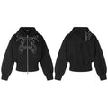Black cropped zip-up hoodie shown front and back with rhinestone scroll motifs on the chest and upper back
