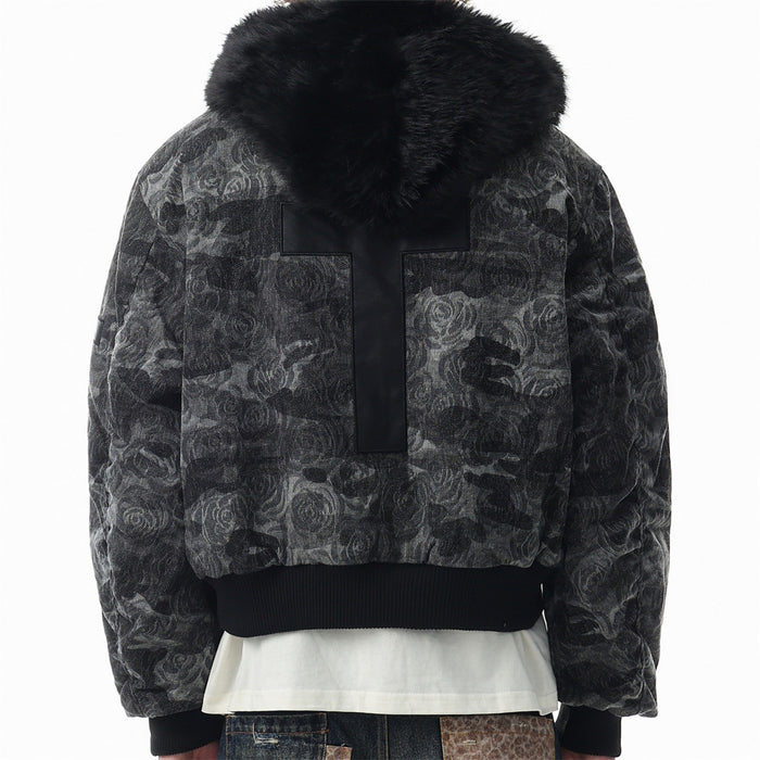 Back model view of the dark rose-patterned bomber jacket with black faux fur collar and cross-shaped patch