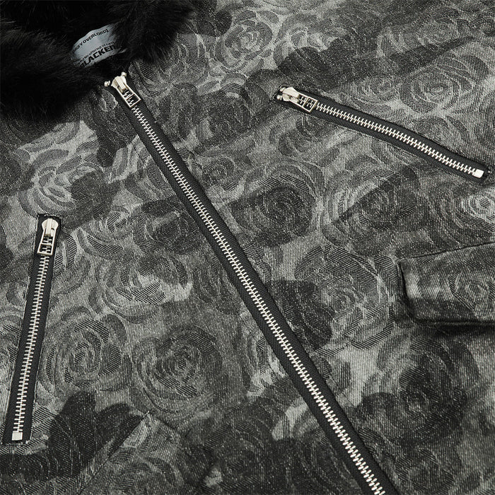 Close-up of the patterned jacket front showing the central zipper and two angled silver zip pockets