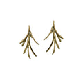 A pair of bronze rosemary leaf post earrings against a black background.