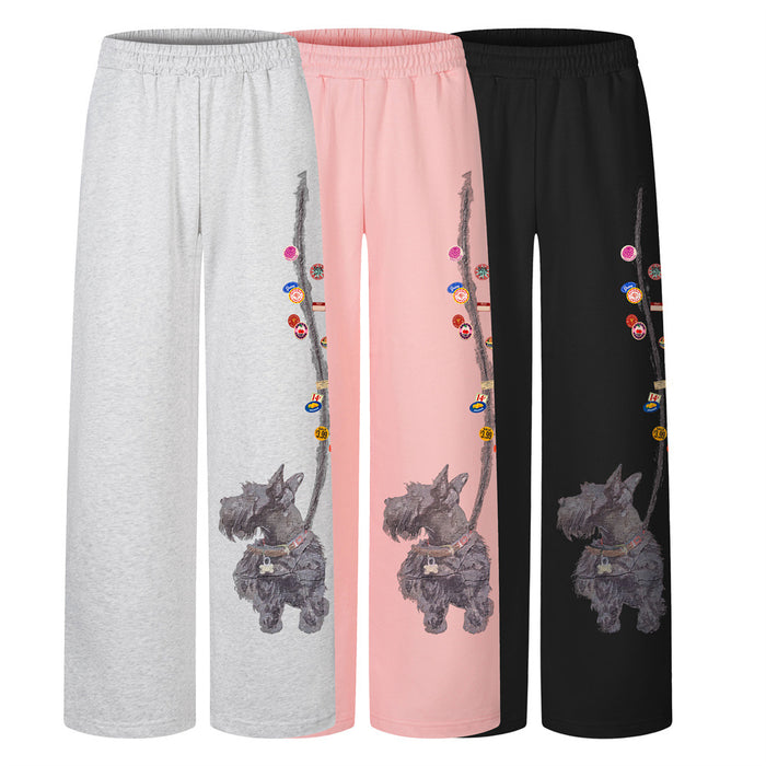 Wide-leg sweatpants in gray, pink, and black with elastic waists and Scottie dog leg graphics