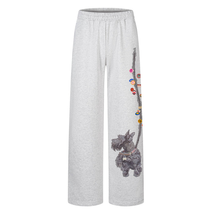 Light gray wide-leg sweatpants featuring a Scottie dog graphic and colorful accents along one leg