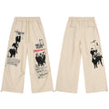 Cream wide-leg pants with black vintage cinema graphic prints and red text, shown front and back on white background