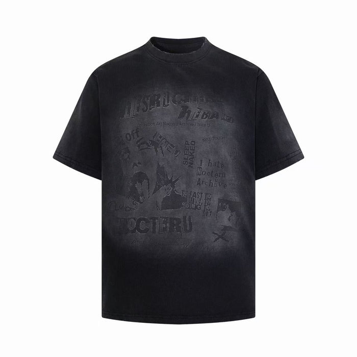 Washed black oversized graphic tee with faded gothic-style print and vintage distressed finish
