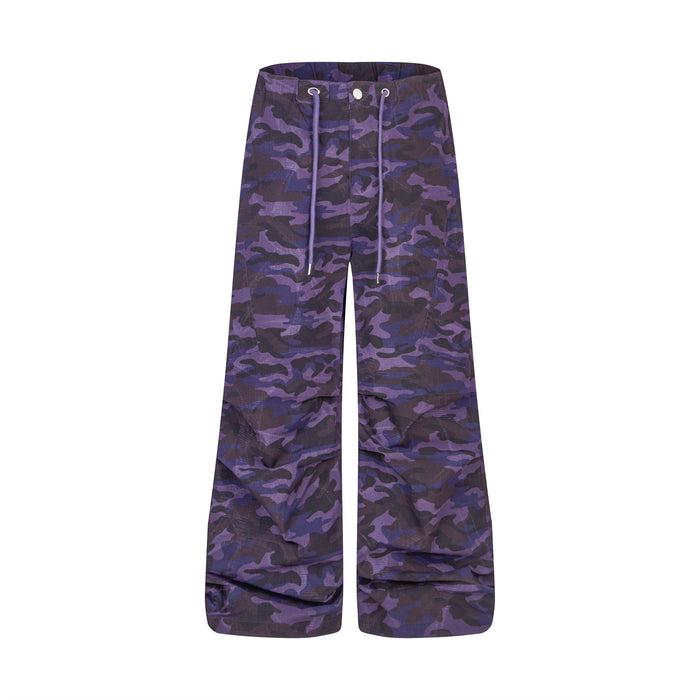Purple camouflage wide-leg cargo pants with drawstring waist and utility pockets, front view