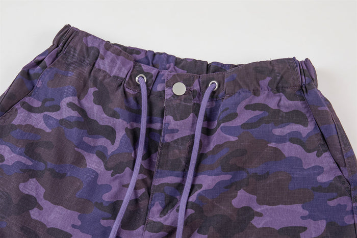 Purple camo waistband with drawstring and snap button detail