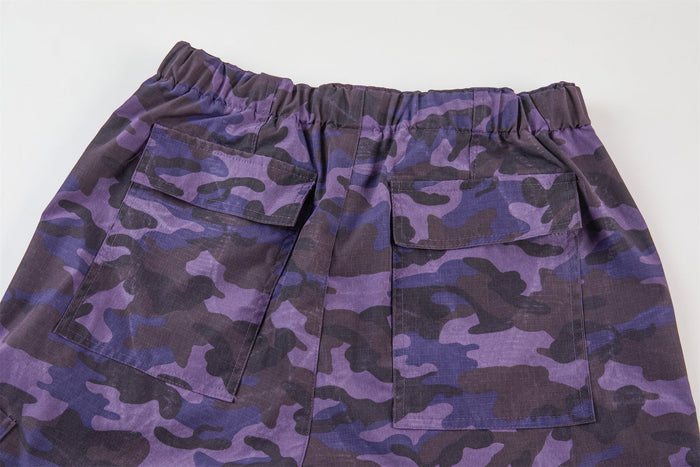 Purple camo back pockets on wide-leg cargo pants