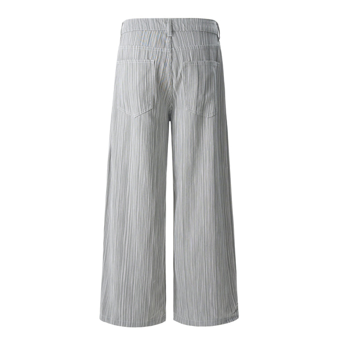 Back view of gray striped wide-leg pants with patch pockets and a high waist