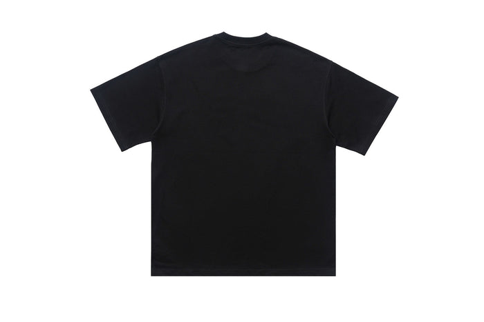 Black oversized graphic tee with a minimalist back view, short sleeves, and streetwear style on a white background