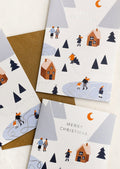 A set of holiday cards with image of snowy hill and text reading "Merry christmas".