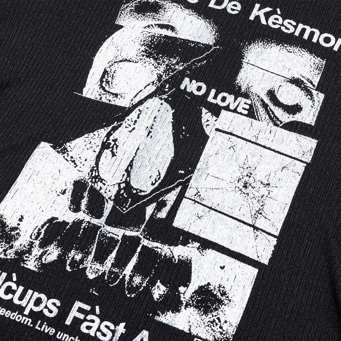 Detailed view of the black shirt's central monochrome graphic with white text and distressed printed artwork