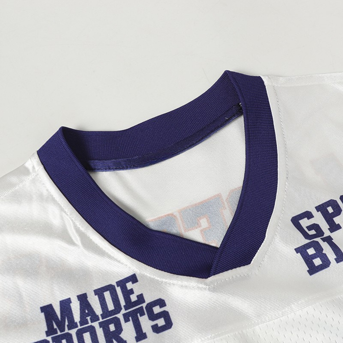 White retro football jersey with navy ribbed V-neck and bold Made for Sports lettering on the chest