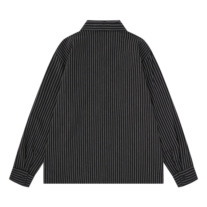 Black striped long sleeve shirt shown from the back with straight hem and button cuffs