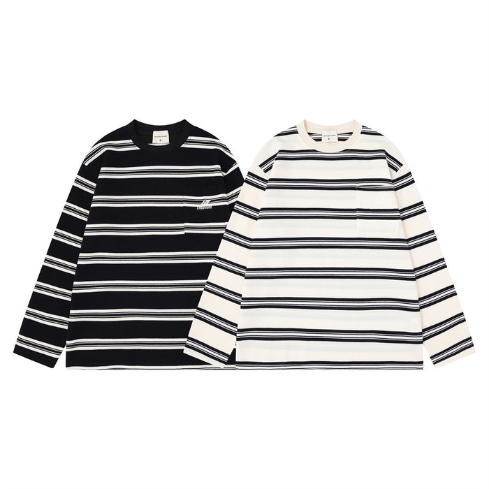 Two striped long-sleeve crew neck shirts shown front-facing in black and cream with contrasting horizontal stripes