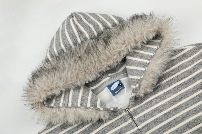 Close-up of the striped hood showing its fluffy faux fur trim, lining, and front zipper