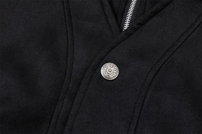 Close-up of a black bomber jacket showing a decorative silver snap button beside the front zipper