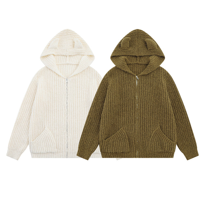Front view of cream and olive-brown knit zip-up hoodies with bear-ear hoods and front pockets