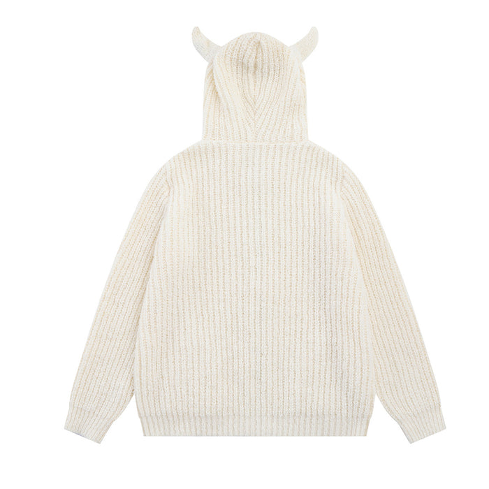 Back view of the cream knit hoodie with bear-ear hood and vertically ribbed sweater texture