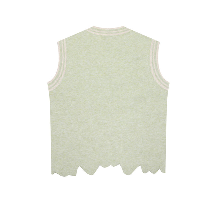 Back view of the pale green knit sweater vest showing striped armhole trim and an irregular scalloped hem