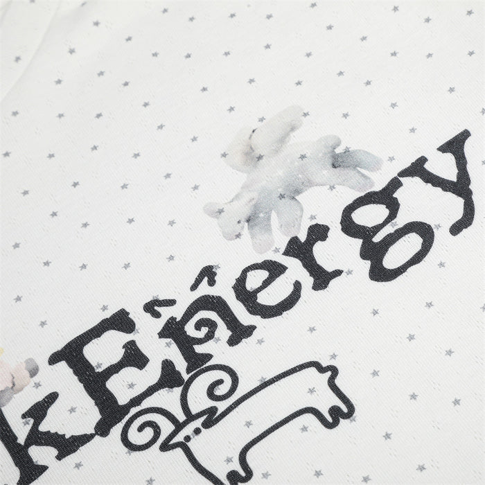 Close-up of the Black Energy chest graphic with a sheep illustration on white fabric covered in gray stars
