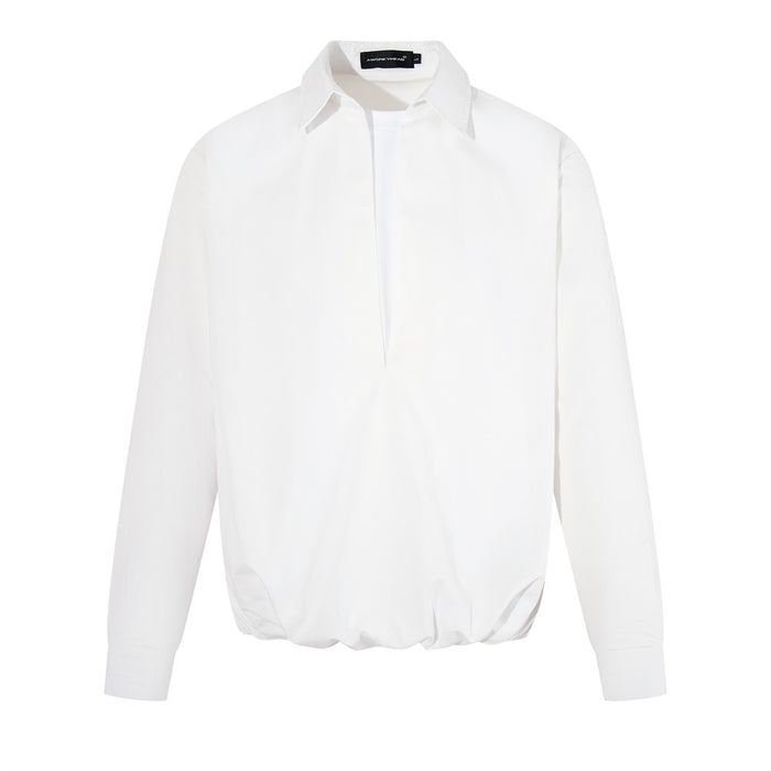 White oversized long sleeve pullover shirt with pointed collar and faux layered V-neck front