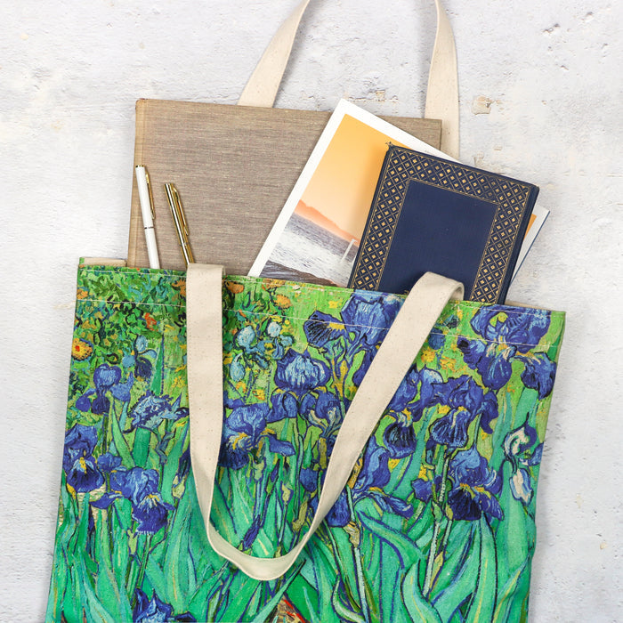 Van Gogh Irises Canvas Tote Bag with books spilling out