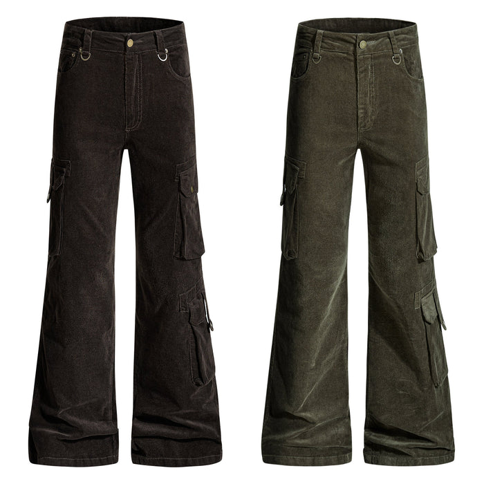 Washed black and olive green utility flared cargo pants with multiple pockets and D-ring hardware, shown flat on white backgr