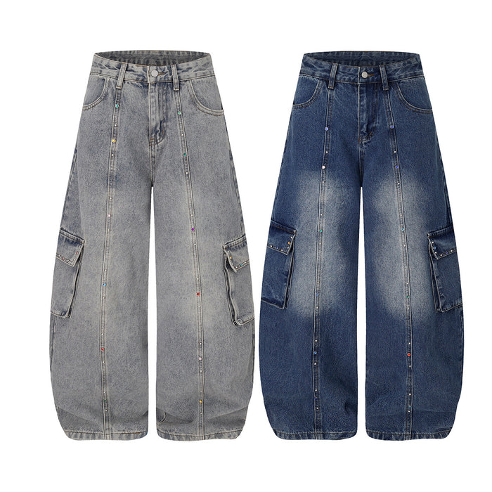 Front view of wide-leg cargo jeans in gray and dark blue denim with rhinestone seam accents and side pockets