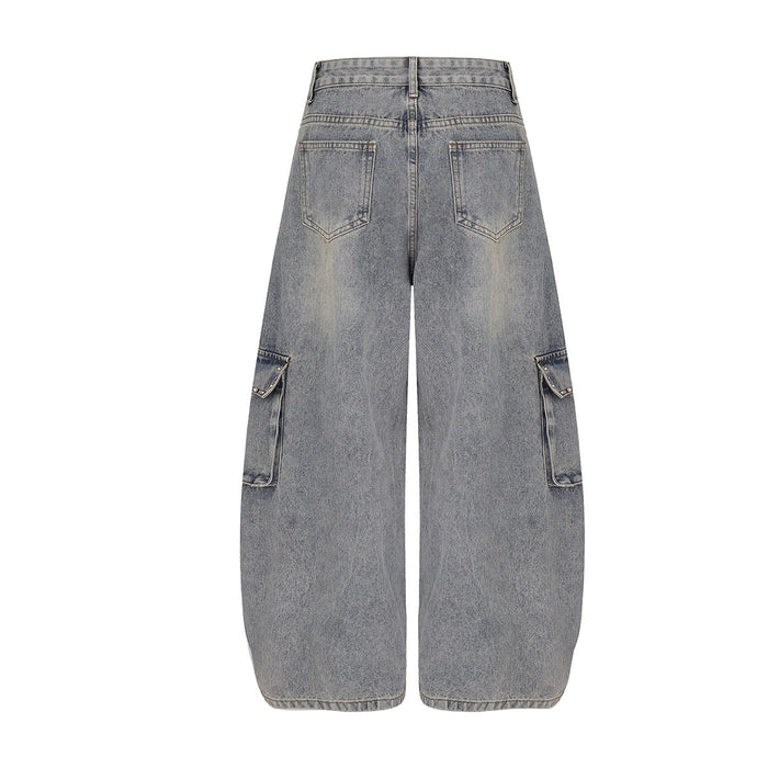 Back view of gray wide-leg cargo jeans with two rear patch pockets and side cargo pockets