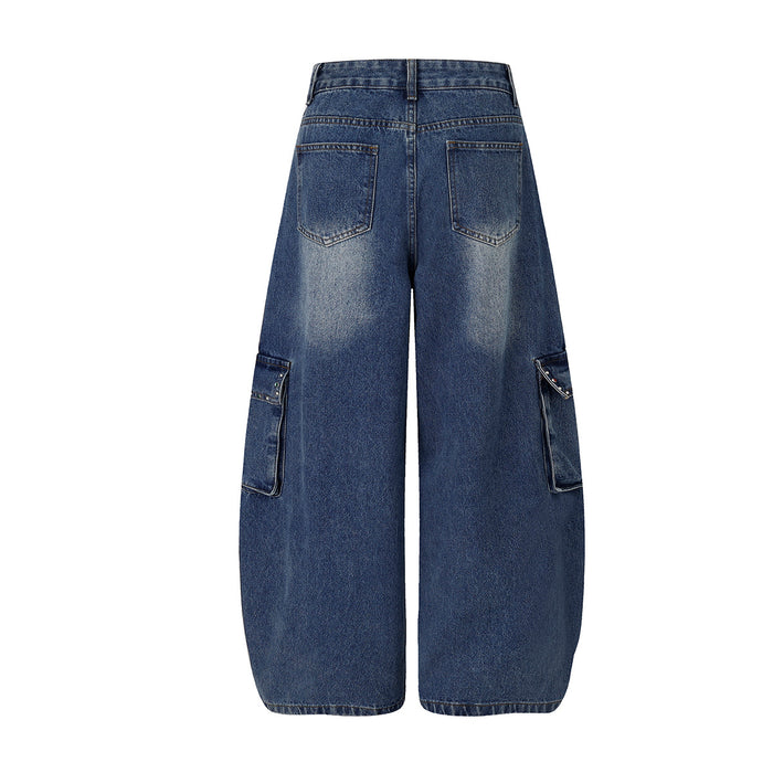 Back view of dark blue wide-leg cargo jeans with rear patch pockets and side cargo pockets